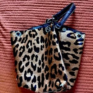 Get wild with this leopard print leather bag